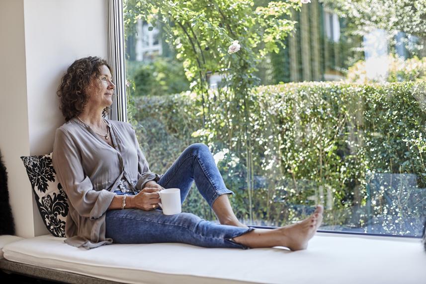 Woman looking out the window
