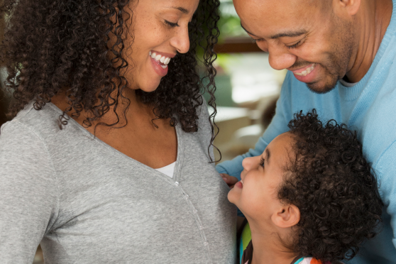 Pregnant woman with her family