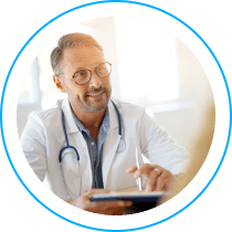 Middle-aged male doctor looking up