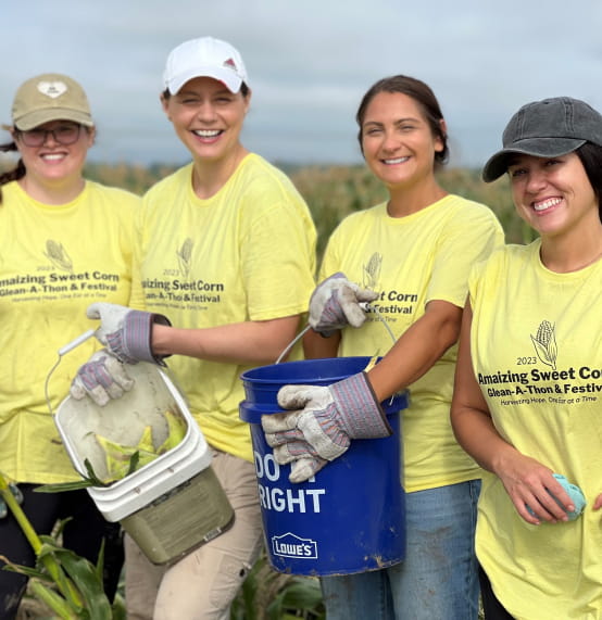 Blue KC employees participated in After the Harvest Sweet Corn Glean-A-Thon to rescue sweet corn from area farms.